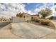 Side yard with gated access and concrete parking area at 1592 Bamboo Bay Dr, Henderson, NV 89012