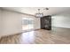 Bright dining room with sliding glass doors and pool view at 1700 Breezewood Dr, Las Vegas, NV 89108