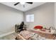 Bedroom with a bed, desk and chair, and ceiling fan at 1906 Palora Ave, Las Vegas, NV 89169