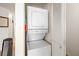 Convenient laundry closet with stacked washer and dryer at 2044 Mesquite Ln # 302, Laughlin, NV 89029