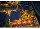 Night view of a home with a putting green and landscape lighting at 2064 Poetry Ave, Henderson, NV 89052