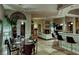 Open concept dining area with hardwood floors at 2064 Poetry Ave, Henderson, NV 89052