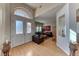 Elegant entryway with double doors and hardwood floors at 2064 Poetry Ave, Henderson, NV 89052