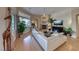 Relaxing living room featuring a white sectional sofa and fireplace at 2064 Poetry Ave, Henderson, NV 89052