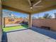 Covered patio with ceiling fan and view of backyard entertainment area at 2242 Valdina St, Henderson, NV 89044