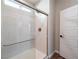 Shower stall with a built-in bench and modern fixtures at 2242 Valdina St, Henderson, NV 89044