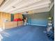 Garage with light colored flooring and wood paneling at 2242 Valdina St, Henderson, NV 89044