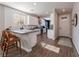 Modern kitchen with white cabinets, gray countertops, and subway tile backsplash at 2242 Valdina St, Henderson, NV 89044