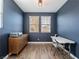 Home office with wood desk and neutral color scheme at 2242 Valdina St, Henderson, NV 89044