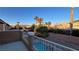 Elevated backyard view, showcasing a pool and mountain views at 2316 Mountain Rail Dr, North Las Vegas, NV 89084