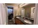 Clean bathroom with double sinks and granite countertops at 2316 Mountain Rail Dr, North Las Vegas, NV 89084