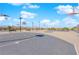 Outdoor basketball courts with multiple hoops, benches, and light posts at 2430 Bellinzona Pl, Henderson, NV 89044