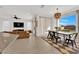 Open concept dining area with a view of the living room and kitchen at 2598 Iron Crest Ln, Las Vegas, NV 89138