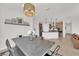 Dining area with farmhouse table and chairs, open to kitchen at 2598 Iron Crest Ln, Las Vegas, NV 89138