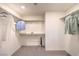 Spacious walk-in closet with ample shelving and hanging space at 2637 Snapdragon Falls Ave # 105, North Las Vegas, NV 89081