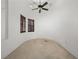 Bright bedroom with ceiling fan and large window at 3020 Via Venezia, Henderson, NV 89052