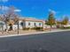 Single-story home with landscaping, driveway and a two-car garage at 3020 Via Venezia, Henderson, NV 89052