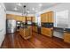 Modern kitchen with stainless steel appliances and hardwood floors at 3020 Via Venezia, Henderson, NV 89052