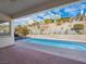 Inviting rectangular pool with brick patio and hilltop view at 3020 Via Venezia, Henderson, NV 89052