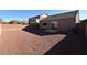 Spacious backyard with gravel and block wall at 304 Whitney Breeze Ave, North Las Vegas, NV 89031