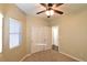 Bedroom with ceiling fan, window blinds and closet at 304 Whitney Breeze Ave, North Las Vegas, NV 89031