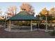 Community gazebo with picnic tables and seating at 304 Whitney Breeze Ave, North Las Vegas, NV 89031