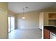 Bright dining area with tile floors and access to a patio at 304 Whitney Breeze Ave, North Las Vegas, NV 89031