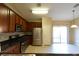 Modern kitchen with stainless steel appliances and ample cabinetry at 304 Whitney Breeze Ave, North Las Vegas, NV 89031