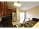 Spacious kitchen featuring stainless steel appliances and granite countertops at 304 Whitney Breeze Ave, North Las Vegas, NV 89031