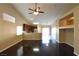 Living room with dark hardwood floors and an open floor plan at 304 Whitney Breeze Ave, North Las Vegas, NV 89031