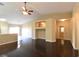 Spacious living room with dark hardwood floors and high ceilings at 304 Whitney Breeze Ave, North Las Vegas, NV 89031