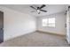 Bright bedroom with ceiling fan and sliding barn door at 3425 Irv Marcus Dr, Las Vegas, NV 89108