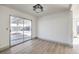 Bright dining room with sliding glass door leading to backyard at 3425 Irv Marcus Dr, Las Vegas, NV 89108