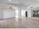 Living room with hardwood floors and a marble fireplace at 3425 Irv Marcus Dr, Las Vegas, NV 89108