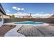 Inviting kidney-shaped pool with ample patio space at 3425 Irv Marcus Dr, Las Vegas, NV 89108