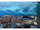 Night time aerial view of Las Vegas skyline with city lights and hotels at 3722 Las Vegas Blvd # 3102, Las Vegas, NV 89158