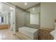 Modern bathroom with a soaking tub and city view at 3722 Las Vegas Blvd # 3102, Las Vegas, NV 89158