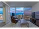 Modern living room boasts city views and features a leather chair at 3722 Las Vegas Blvd # 3102, Las Vegas, NV 89158