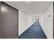 Clean and well-lit hallway with carpeted floors at 3930 University Center Dr # 410, Las Vegas, NV 89119