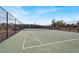 Tennis court with a chain link fence at 3930 University Center Dr # 410, Las Vegas, NV 89119