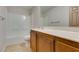 Clean bathroom, featuring a shower/tub combo and wood vanity at 3988 Salisbury Pl, Las Vegas, NV 89121