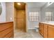 Bathroom with walk-in shower, double vanity, and concrete floor at 3988 Salisbury Pl, Las Vegas, NV 89121