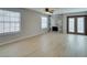 Living room with a stone fireplace and light-colored wood floors at 3988 Salisbury Pl, Las Vegas, NV 89121