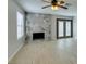 Close-up view of a stylish stone fireplace in the living room at 3988 Salisbury Pl, Las Vegas, NV 89121