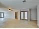 Living room with hardwood floors and sliding glass doors at 3988 Salisbury Pl, Las Vegas, NV 89121