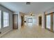 Living room with light floors, a fireplace, and access to other rooms at 3988 Salisbury Pl, Las Vegas, NV 89121