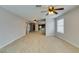 Open living area showcasing wood-look floors and a view into the kitchen at 3988 Salisbury Pl, Las Vegas, NV 89121