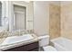 Small bathroom with granite vanity and bathtub at 4063 Villa Rafael Dr, Las Vegas, NV 89141