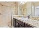 Bathroom with granite countertop and walk-in shower at 4063 Villa Rafael Dr, Las Vegas, NV 89141