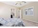 Main bedroom with ensuite bathroom and window with plantation shutters at 4063 Villa Rafael Dr, Las Vegas, NV 89141